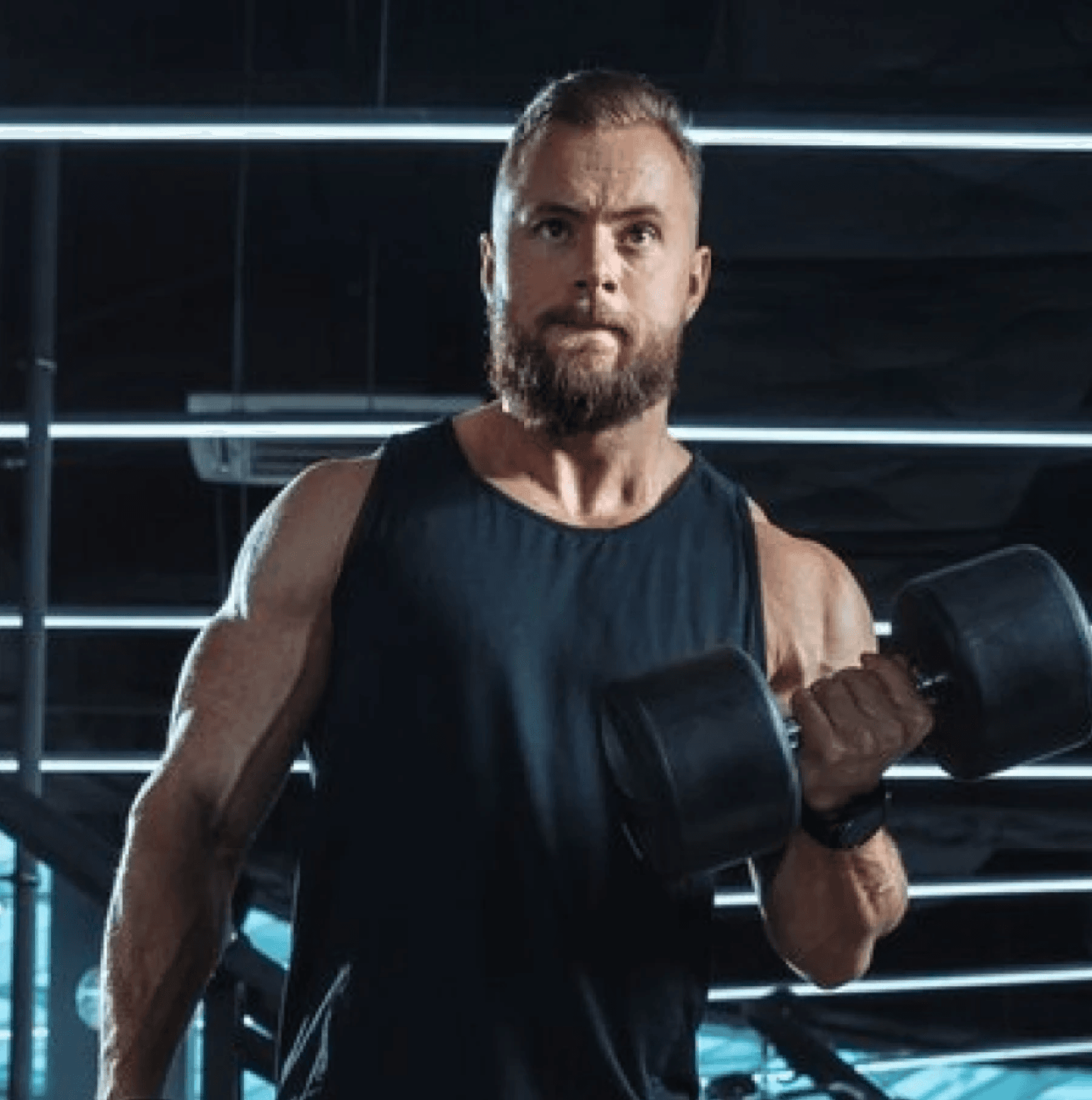 A coach lifting a dumbbell